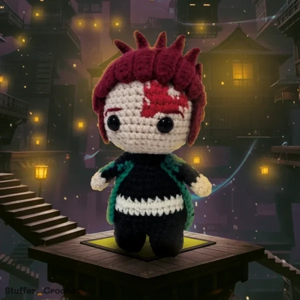 crochet doll with big black eyes and red spiky hair